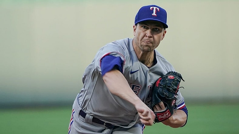 Apr 17, 2023; Kansas City, Missouri, USA; Texas Rangers starting pitcher Jacob deGrom (48) throws a warm up pitch against the Kansas City Royals during the game at Kauffman Stadium. Mandatory Credit: Denny Medley-USA TODAY Sports