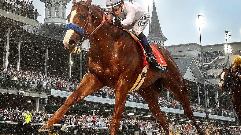 Finish line lights illuminate Justify, and jockey Mike Smith as they cross the finish line at Churchill Downs in a driving rain to win the 144th running of the Kentucky Derby and the first leg of the Triple Crown.May 5, 2018

Clevengereclipseentry1