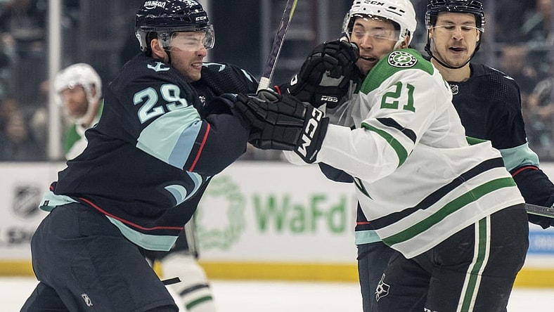 May 7, 2023; Seattle, Washington, USA; Seattle Kraken defenseman Vince Dunn (29) and Dallas Stars forward Jason Robertson (21) shove one another during the first period in game three of the second round of the 2023 Stanley Cup Playoffs at Climate Pledge Arena. Mandatory Credit: Stephen Brashear-USA TODAY Sports