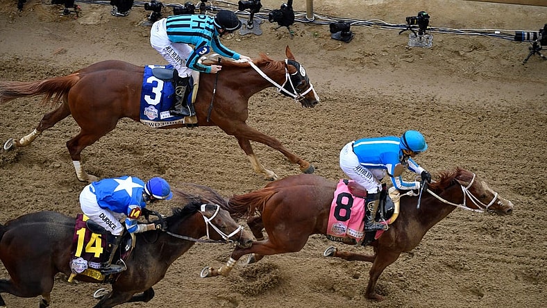 Mage, with Javier Castellano up (8) leads Two Phil's, with Jareth Loveberry up (3) and Angel of Empire, with Flavien Prat up across the line to win the 147th running of The Kentucky Derby, Saturday, May 6, 2023 in Louisville, Ky.