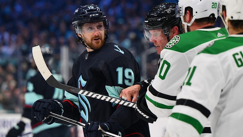 May 9, 2023; Seattle, Washington, USA; Seattle Kraken left wing Jared McCann (19) is separated from Dallas Stars defenseman Ryan Suter (20) during the second period in game four of the second round of the 2023 Stanley Cup Playoffs at Climate Pledge Arena. Mandatory Credit: Steven Bisig-USA TODAY Sports