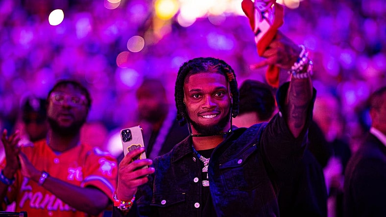 May 11, 2023; Philadelphia, Pennsylvania, USA; NFL player Damar Hamlin cheers during player introductions before game six of the 2023 NBA playoffs between the Philadelphia 76ers and the Boston Celtics at Wells Fargo Center. Mandatory Credit: Bill Streicher-USA TODAY Sports