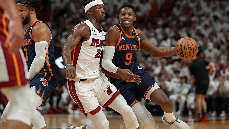 May 12, 2023; Miami, Florida, USA; New York Knicks guard RJ Barrett (9) drives around Miami Heat forward Jimmy Butler (22) in the first half during game six of the 2023 NBA playoffs at Kaseya Center. Mandatory Credit: Jim Rassol-USA TODAY Sports