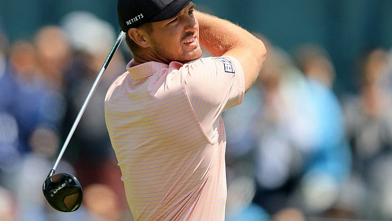 May 18, 2023; Rochester, New York, USA; Bryson DeChambeau tees off on the 14th hole during the first round of the PGA Championship golf tournament at Oak Hill Country Club. Mandatory Credit: Aaron Doster-USA TODAY Sports