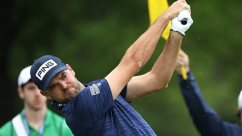 Corey Conners hits his tee shot the 7th-hole.