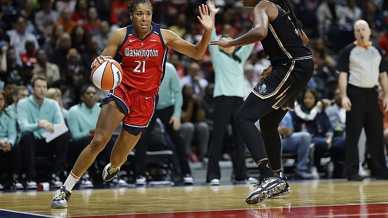 May 19, 2023; Washington, District of Columbia, USA; Washington Mystics forward Tianna Hawkins (21) drives to the basket as New York Liberty forward Jonquel Jones (35) defends at Entertainment & Sports Arena. Mandatory Credit: Geoff Burke-USA TODAY Sports