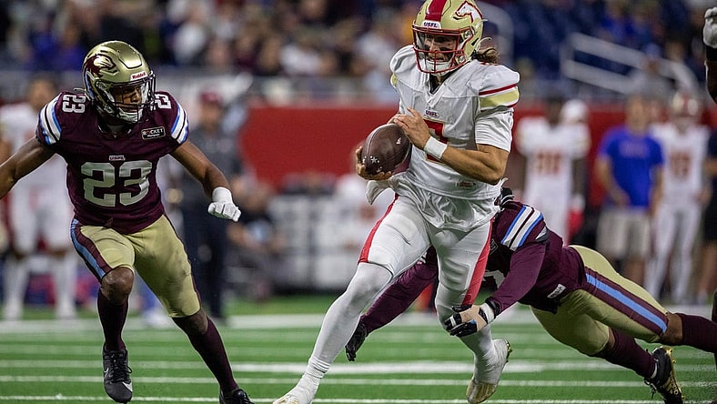 Birmingham Stallions' Alex McGough (11) runs the ball against the Michigan Panthers   defense at Ford Field in Detroit on Saturday, May 20, 2023.