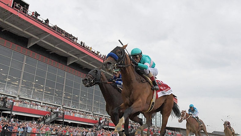 May 20, 2023; Baltimore, Maryland, USA;  National Treasure with John R. Velazquez up (1) defeats Blazing Sevens with Irad Ortiz, Jr. up (7) to win the 148th running of the Preakness Stakes at Pimlico Race Course. Mandatory Credit: Tommy Gilligan-USA TODAY Sports