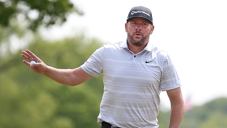 Michael Block waves to fans after his par putt on the 4th hole during the final round at the PGA Championship at Oak Hill Country Club Sunday, May 21, 2023.
