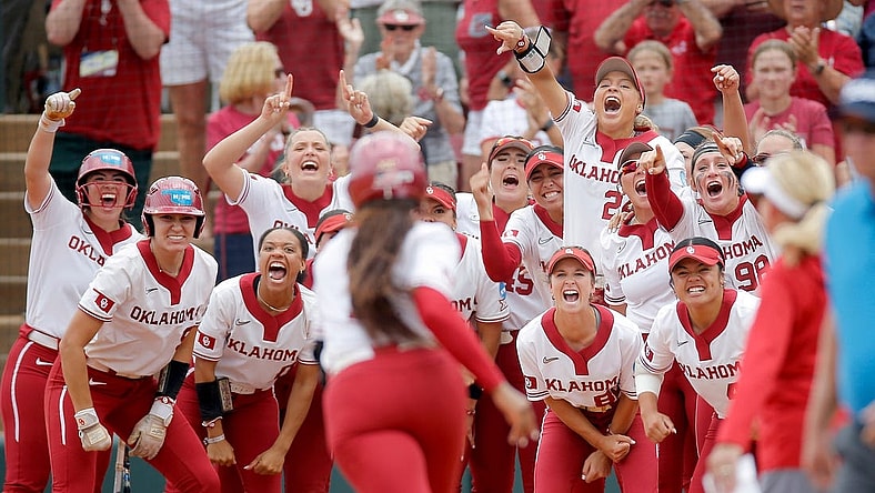 Oklahoma celebrates the home run of Oklahoma's Cydney Sanders (1) in the fourth inning during the NCAA Norman Super Regional softball game between the University of Oklahoma Sooners and the Clemson Tigers at Marita Hynes Field in Norman, Okla., Friday, May, 26, 2023.