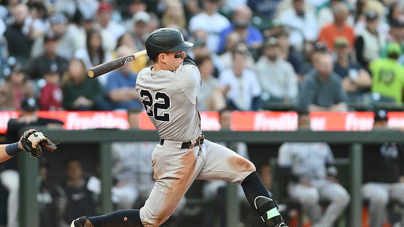 May 29, 2023; Seattle, Washington, USA; New York Yankees center fielder Harrison Bader (22) hits a single against the Seattle Mariners during the third inning at T-Mobile Park. Mandatory Credit: Steven Bisig-USA TODAY Sports
