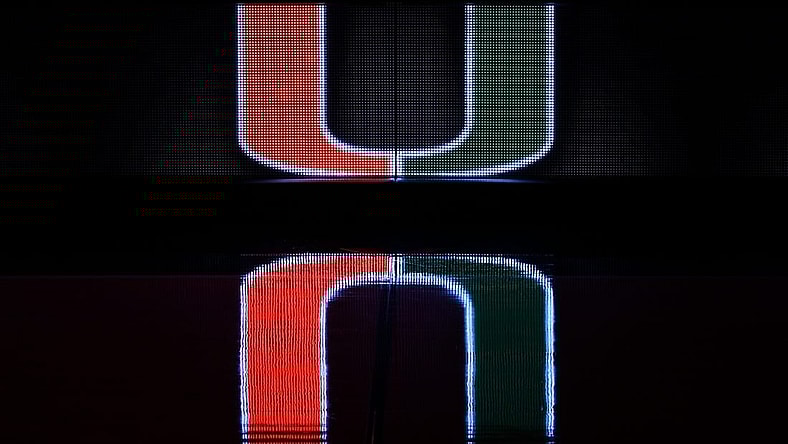 Dec 8, 2020; Coral Gables, Florida, USA; A general view of a reflection of the Miami Hurricanes school logo on the scorers table prior to the game between the Miami Hurricanes and the Purdue Boilermakers at Watsco Center. Mandatory Credit: Jasen Vinlove-USA TODAY Sports
