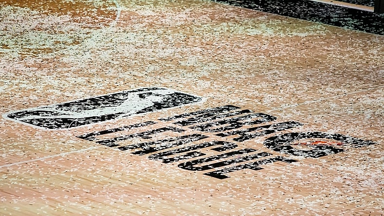 Mar 11, 2021; Orlando, Florida, USA; The NBA G League logo is covered in confetti after the Final between the Delaware Blue Coats and the Lakeland Magic at AdventHealth Arena. Mandatory Credit: Mary Holt-USA TODAY Sports