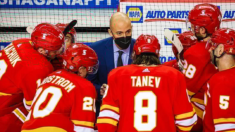 Mar 27, 2021; Calgary, Alberta, CAN; Calgary Flames assistant Coach Ryan Huska on his bench against the Winnipeg Jets during the third period at Scotiabank Saddledome. Mandatory Credit: Sergei Belski-USA TODAY Sports