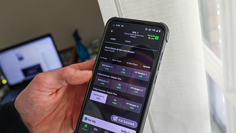 Ryan Cristman, 35, of Ferndale is suing DraftKings, an online sports betting operator,  and seeking class action status claiming they are cheating gamblers out of their winnings. Cristman, who is photographed at home on Friday, June 4, 2021; says that he made a bet in February against the Bruins and after making a screen shot of the winnings, DraftKings informed him that he did not win.

Draftkings 060421 Kpm 374