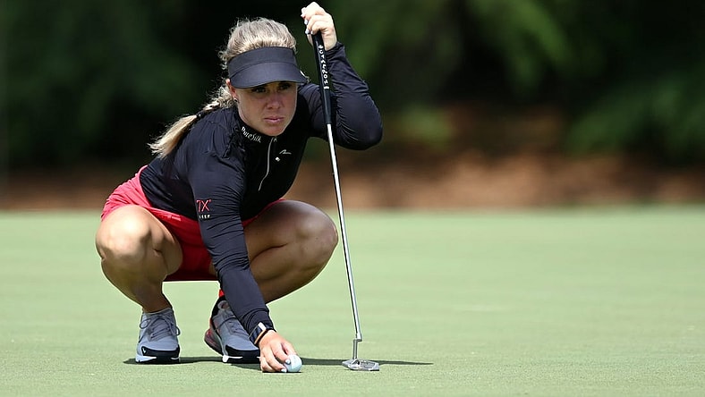 Jun 24, 2021; John's Creek, Georgia, USA; Dani Holmqvist lines up a putt on the sixth green during the first round of the KPMG Women's PGA Championship golf tournament at the Atlanta Athletic Club. Mandatory Credit: Adam Hagy-USA TODAY Sports