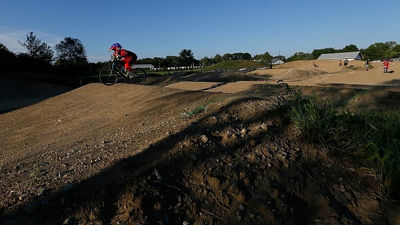 Ryder Osowski of Westerville takes a warm-up lap around the course during the weekly organized racing at the new Westerville BMX course at Alum Creek South Park on Tuesday, Sept. 7, 2021. The 1,000-foot track just opened for racing at the beginning of August.

Westerville Bmx