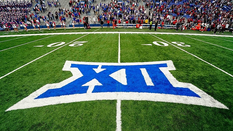 Oct 23, 2021; Lawrence, Kansas, USA; A general view of the Big 12 Conference logo on the field after the game between the Kansas Jayhawks and the Oklahoma Sooners at David Booth Kansas Memorial Stadium. Mandatory Credit: Jay Biggerstaff-USA TODAY Sports