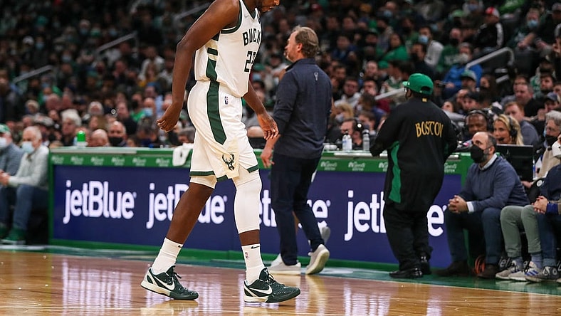 Dec 13, 2021; Boston, Massachusetts, USA; Milwaukee Bucks forward Khris Middleton (22) walks off the court after injuring his knee during the second half against the Boston Celtics at TD Garden. Mandatory Credit: Paul Rutherford-USA TODAY Sports