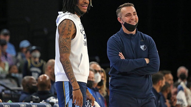 Jan 13, 2022; Memphis, Tennessee, USA; Memphis Grizzles guard Ja Morant (left) and acting head coach Darko Rajakovic (right) react to a foul call during the first half against the Minnesota Timberwolves at FedExForum. Mandatory Credit: Petre Thomas-USA TODAY Sports