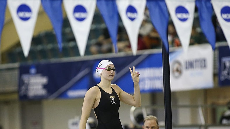 Mar 18, 2022; Atlanta, Georgia, USA; Virginia Cavaliers swimmer Emma Weyant is introduced before the 400 IM at the NCAA Swimming & Diving Championships at Georgia Tech. Mandatory Credit: Brett Davis-USA TODAY Sports