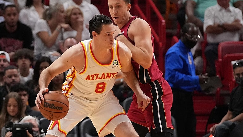 Apr 26, 2022; Miami, Florida, USA; Atlanta Hawks forward Danilo Gallinari (8) dribbles the ball against Miami Heat guard Duncan Robinson (55) during the first half in game five of the first round for the 2022 NBA playoffs at FTX Arena. Mandatory Credit: Jasen Vinlove-USA TODAY Sports