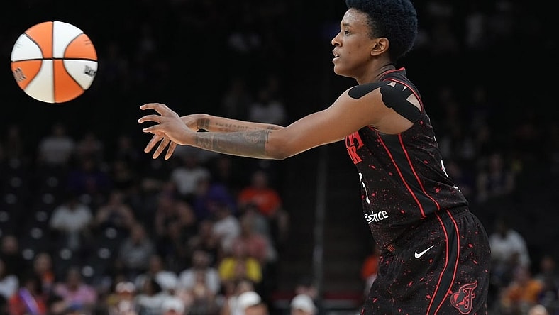 Jun 29, 2022; Phoenix, Arizona, USA; Indiana Fever guard Danielle Robinson (3) passes the ball against the Phoenix Mercury during the second half at Footprint Center. Mandatory Credit: Joe Camporeale-USA TODAY Sports