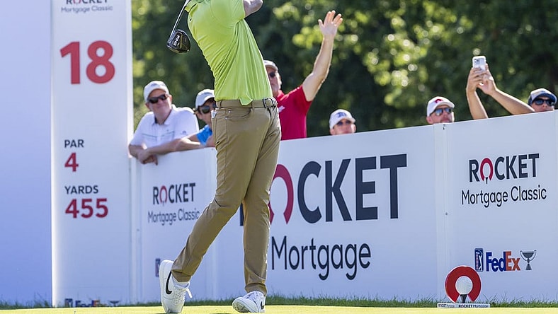 Jul 31, 2022; Detroit, Michigan, USA; Tony Finau hits his tee shot on the par 4 eighteenth hole during the final round of the Rocket Mortgage Classic golf tournament. Mandatory Credit: Raj Mehta-USA TODAY Sports