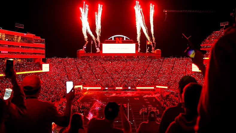 Oct 1, 2022; Lincoln, Nebraska, USA; Fans participate in a light show at the end of the third quarter between the Nebraska Cornhuskers and the Indiana Hoosiers at Memorial Stadium. Mandatory Credit: Dylan Widger-USA TODAY Sports