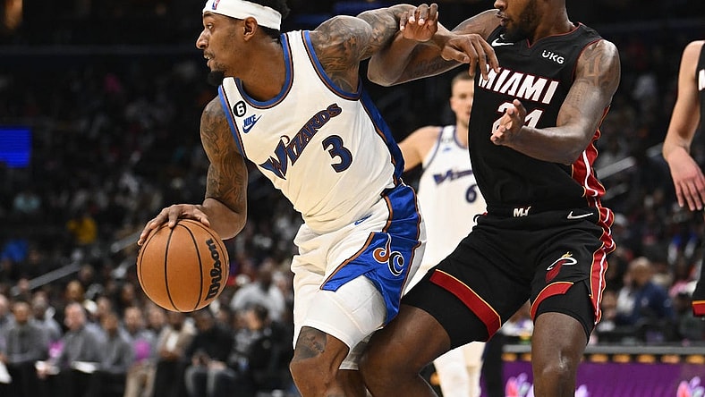 Nov 18, 2022; Washington, District of Columbia, USA; Washington Wizards guard Bradley Beal (3) dribbles as Miami Heat forward Haywood Highsmith (24) defends during the second half at Capital One Arena. Mandatory Credit: Brad Mills-USA TODAY Sports