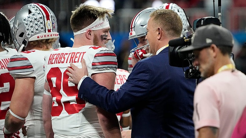 Dec 31, 2022; Atlanta, Georgia, USA; ESPN announcer Kirk Herbstreit talks to his son, Ohio State Buckeyes tight end Zak Herbstreit (89), prior to the Peach Bowl in the College Football Playoff semifinal at Mercedes-Benz Stadium. Mandatory Credit: Adam Cairns-The Columbus Dispatch

Ncaa Football Peach Bowl Ohio State At Georgia