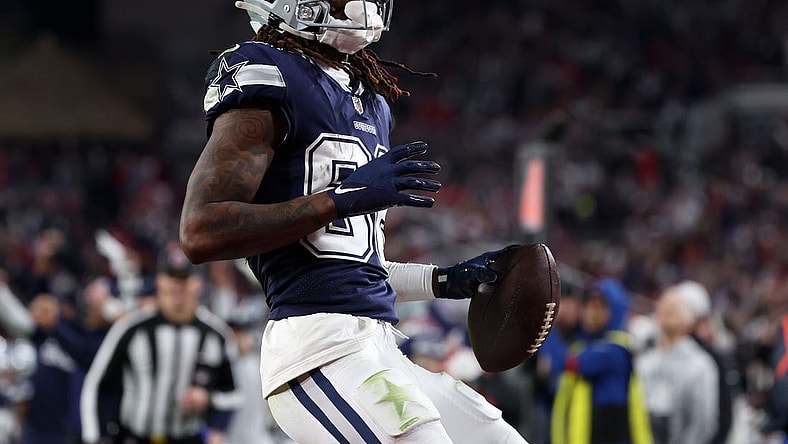 Jan 16, 2023; Tampa, Florida, USA; Dallas Cowboys wide receiver CeeDee Lamb (88) makes a touchdown catch against the Tampa Bay Buccaneers in the second half during the wild card game at Raymond James Stadium. Mandatory Credit: Kim Klement-USA TODAY Sports