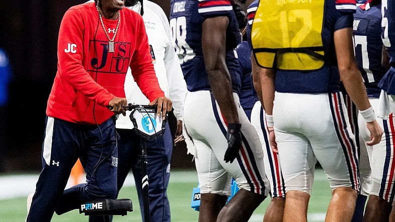 Deion Sanders coaches during the 2021 Celebration Bowl. Sanders required a scooter following blood clot issues that ultimately led to the amputation of some toes.

Syndication The Clarion Ledger