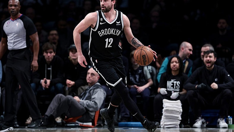 Mar 21, 2023; Brooklyn, New York, USA; Brooklyn Nets forward Joe Harris (12) dribbles during the first half against the Cleveland Cavaliers at Barclays Center. Mandatory Credit: Vincent Carchietta-USA TODAY Sports
