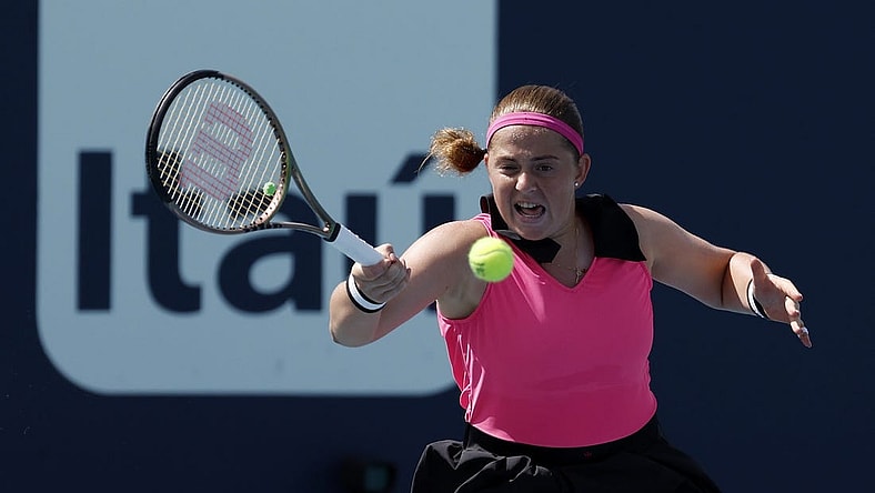 Mar 27, 2023; Miami, Florida, US; Jelena Ostapenko (LAT) hits a forehand against Martina Trevisan (ITA) (not pictured) on day eight of the Miami Open at Hard Rock Stadium. Mandatory Credit: Geoff Burke-USA TODAY Sports