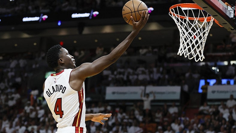Apr 22, 2023; Miami, Florida, USA; Miami Heat guard Victor Oladipo (4) drives to the basket in the fourth quarter against the Milwaukee Bucks during game three of the 2023 NBA Playoffs at Kaseya Center. Mandatory Credit: Sam Navarro-USA TODAY Sports