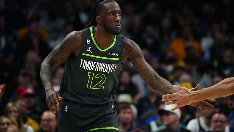 Apr 25, 2023; Denver, Colorado, USA; Minnesota Timberwolves forward Taurean Prince (12) celebrates his three point score in the first half against the Denver Nuggets in game five of the 2023 NBA Playoffs at Ball Arena. Mandatory Credit: Ron Chenoy-USA TODAY Sports