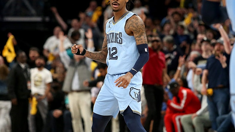 Apr 26, 2023; Memphis, Tennessee, USA; Memphis Grizzlies guard Ja Morant (12) reacts during the second half against the Los Angeles Lakers during game five of the 2023 NBA playoffs at FedExForum. Mandatory Credit: Petre Thomas-USA TODAY Sports