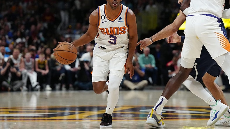 May 1, 2023; Denver, Colorado, USA; Phoenix Suns guard Chris Paul (3) controls the ball in the first quarter against the Denver Nuggets during game two of the 2023 NBA playoffs at Ball Arena. Mandatory Credit: Ron Chenoy-USA TODAY Sports