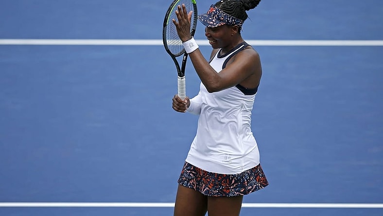 Venus Williams celebrates after her win against Kiki Bertens at the Lindner Family Tennis Center in Mason, Ohio, on Tuesday, Aug. 13, 2019. Williams won in three sets, 6-3, 3-6, 7-4.