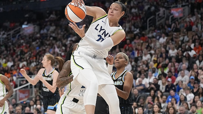 May 13, 2023; Toronto, Ontario, Canada; Minnesota Lynx guard Kayla McBride (21) rebounds against the Chicago Sky during the first half at Scotiabank Arena. Mandatory Credit: John E. Sokolowski-USA TODAY Sports
