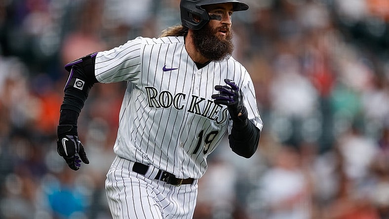 May 25, 2023; Denver, Colorado, USA; Colorado Rockies pinch hitter Charlie Blackmon (19) runs to first on a single in the eighth inning against the Miami Marlins at Coors Field. Mandatory Credit: Isaiah J. Downing-USA TODAY Sports