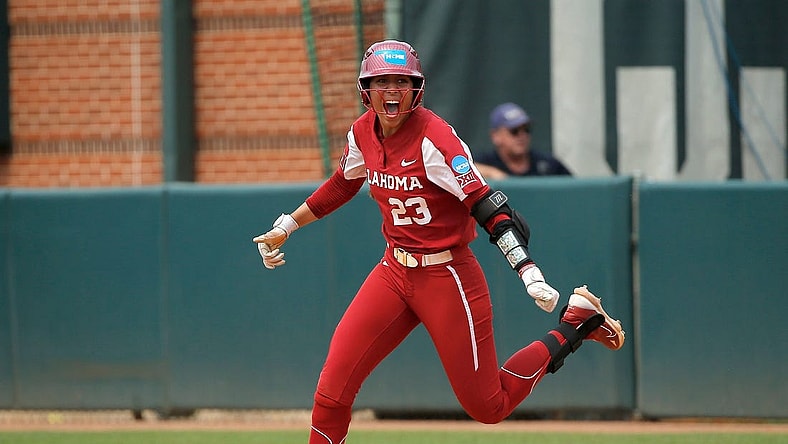 Oklahoma's Tiare Jennings (23) celebrates her game-winning run in the ninth inning during the NCAA Norman Super Regional softball game between the University of Oklahoma Sooners and the Clemson Tigers at Marita Hynes Field in Norman, Okla., Saturday, May, 27, 2023.