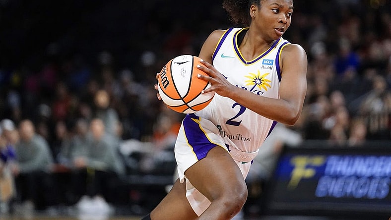 May 27, 2023; Las Vegas, Nevada, USA; Los Angeles Sparks guard Nia Clouden (2) drives the ball against the Las Vegas Aces during the fourth quarter at Michelob Ultra Arena. Mandatory Credit: Lucas Peltier-USA TODAY Sports