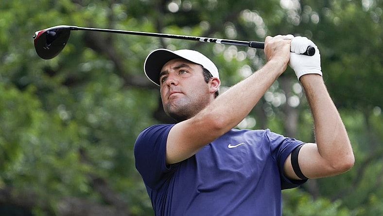 May 28, 2023; Fort Worth, Texas, USA; Scottie Scheffler plays his shot from the second tee during the final round of the Charles Schwab Challenge golf tournament. Mandatory Credit: Raymond Carlin III-USA TODAY Sports