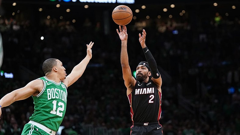 May 29, 2023; Boston, Massachusetts, USA; Miami Heat guard Gabe Vincent (2) shoots a three pointer against Boston Celtics forward Grant Williams (12) in the second quarter during game seven of the Eastern Conference Finals for the 2023 NBA playoffs at TD Garden. Mandatory Credit: David Butler II-USA TODAY Sports