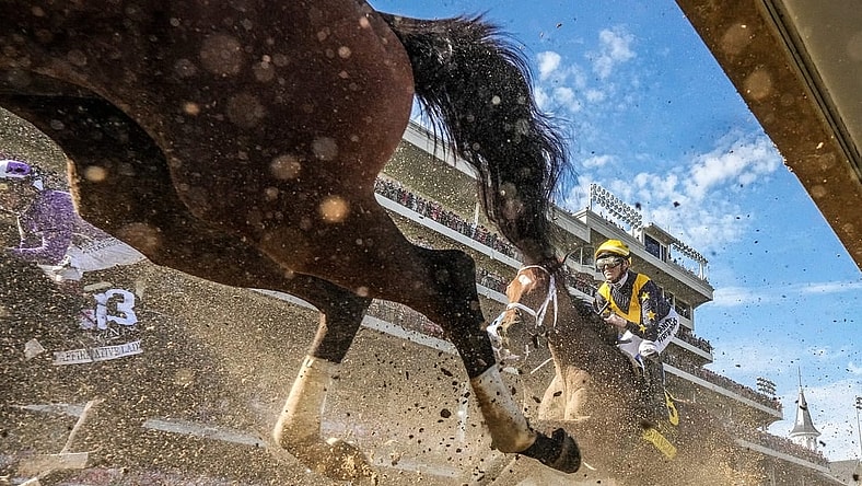 The field for the 149th Running of the Kentucky Oak makes their way past the grandstands at Churchill Downs on May 5, 2023