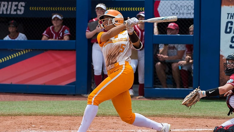 Jun 1, 2023; Oklahoma City, OK, USA;  Tennessee Lady Vols left fielder Rylie West (5) watches her home run in the fourth inning against the Alabama Crimson Tide during the Womens College World Series at USA Softball Hall of Fame Stadium. Mandatory Credit: Brett Rojo-USA TODAY Sports