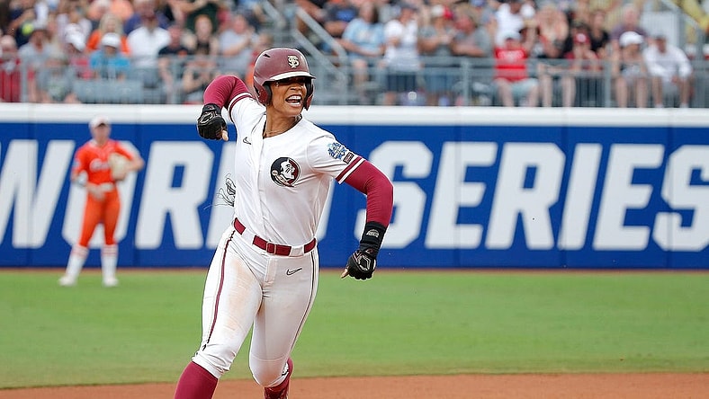 Florida State.'s Michaela Edenfield (51) celebrates a home run in the first inning during a softball game between Oklahoma State Cowgirls and Florida State in the Women's College World Series at USA Softball Hall of Fame Stadium in  in Oklahoma City, Thursday, June, 1, 2023.
