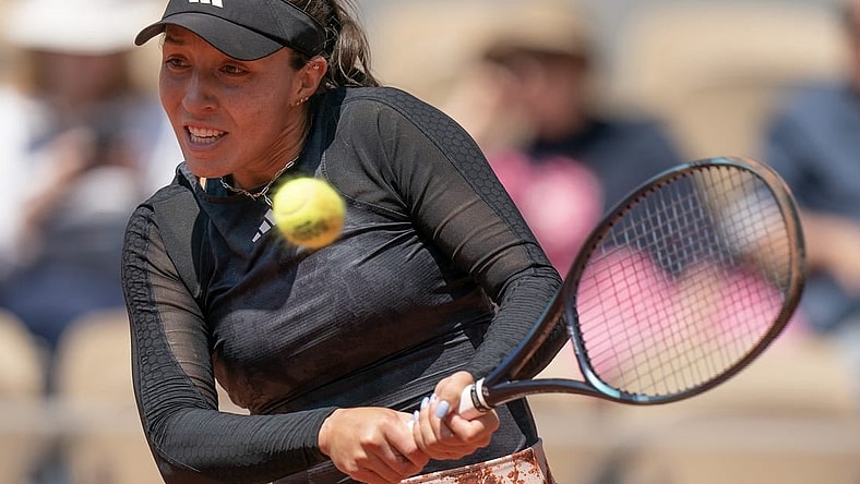 Jun 2, 2023; Paris,France; Jessica Pegula (USA) returns a shot during her match against Elise Mertens (BEL) on day six at Stade Roland-Garros. Mandatory Credit: Susan Mullane-USA TODAY Sports